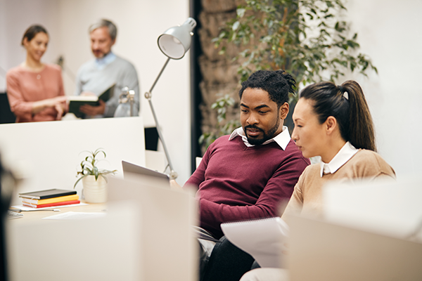 a group of coworkers in a modern office