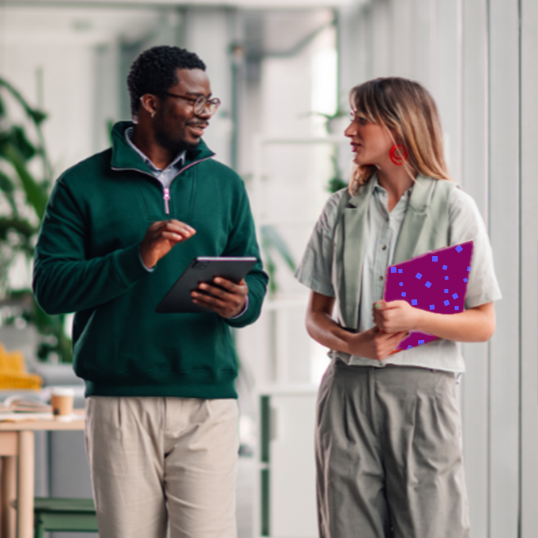 two co-workers talking