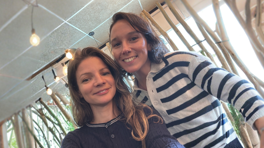 two colleagues smiling in the office 